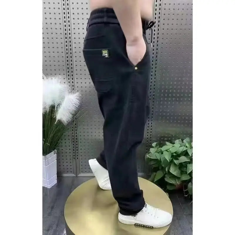 Harajuku Stretch Korea Streetwear Loose Solid Denim Jeans Elastic Waist for Men Spring Summer New plus size 7XL 8XL Casual Pants