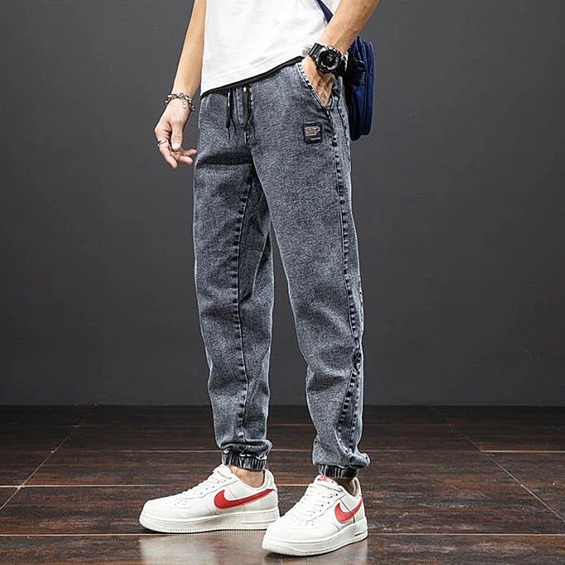 Large size elastic workwear jeans, men's ankle tied Harlan pants, wear-resistant and fat added, plus size trendy and loose