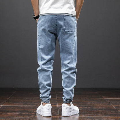 Large size elastic workwear jeans, men's ankle tied Harlan pants, wear-resistant and fat added, plus size trendy and loose