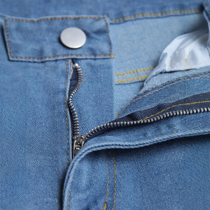 Slim Stretch Destroyed Jeans for Men - Fashionable Skinny Leg Denim with Edgy Ripped Accents