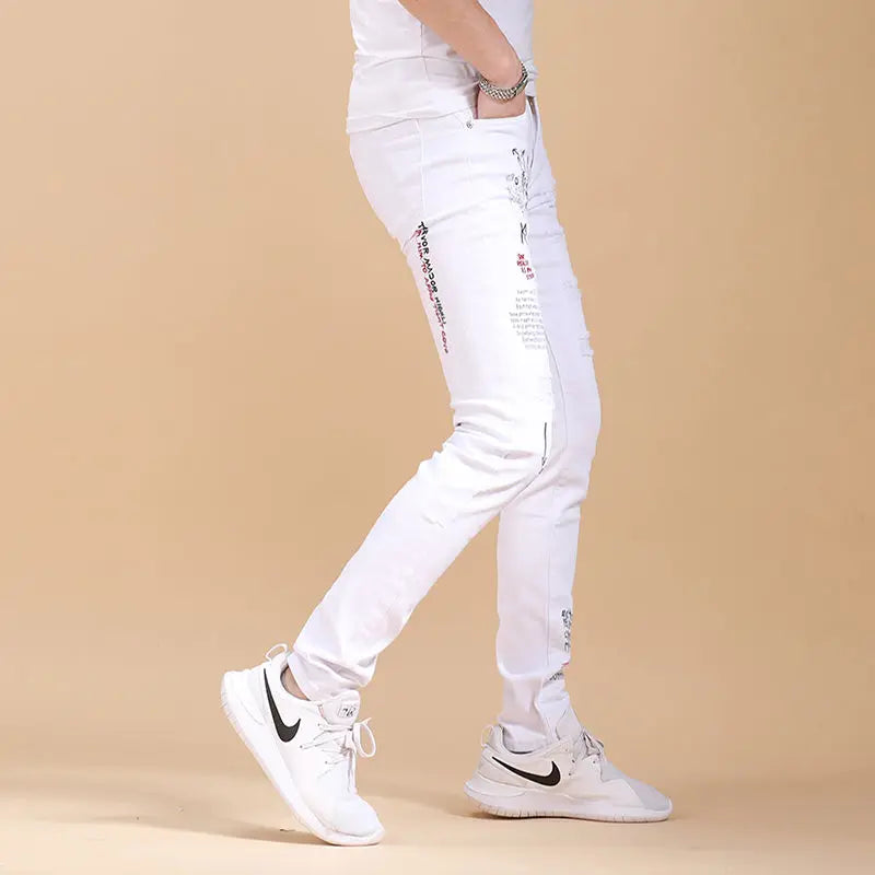 Harajuku Korean Luxury Clothing Men's White Slim Jeans with Printed Ripped Holes Autumn Hip Hop Distressed Cotton Trousers Male